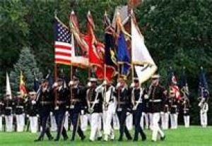 The five branches of the Armed Forces proudly carrying their flags